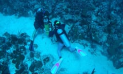 Researchers deploy a hydrophone on a coral reef shelf edge habitat called Weinberg Reef