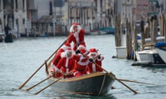 Christmas in Venice <br>This was taken on Boxing day in 2011 . I was on a Vaporetta going down the Grand Canal in Venice when we came upon this boat full of people dressed as Santa Claus.. Everyone on the boat was laughing and enjoying the unexpected sight. It made my Christmas! 