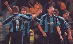 Darren Huckerby celebrating with teammates as Coventry beat Manchester United in 1997