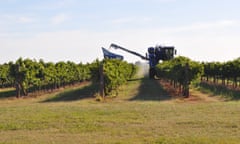 Machinery at work on Bruno Altin's 120-hectare vineyard outside Griffith, central NSW