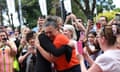 Singer Delta Goodrem hugs fan Justine Edwards outside a state memorial service for Olivia Newton-John at Hamer Hall in Melbourne.