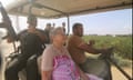 In this still image taken from video, Hamas militants transport Yaffa Adar, 85, an Israeli civilian kidnapped from Nir Oz, into Gaza in a golf cart, on 7 October.