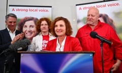 Labor’s Jodie Belyea claims victory in the Dunkley byelection as deputy prime minister Richard Marles and her family watch on