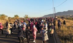 Crowd of garment workers in road