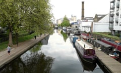 A view of Regents Canal and boats towards Sturts Lock near Sherpherdess Walk and City Road Islington  London N1