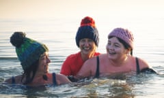 friends sea swimming in winter