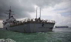 FILE PHOTO: The U.S. Navy guided-missile destroyer USS John S. McCain is seen after a collision, in Singapore waters August 21, 2017. REUTERS/Ahmad Masood/File Photo