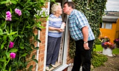 Milk man, Guy Bond, gets a kiss from Crystal Ming on his final round to customers in the village of Weedon, Buckinghamshire. 

For Zoe Williams Saturday Sketch. 

Photograph by Felix Clay