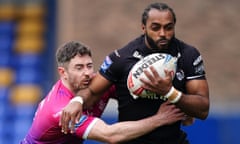 Huddersfield Giants’ Alan Clune and London Broncos’ Iliess Macani in action