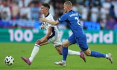 Foden dribbling the ball and challenged by Karničnik