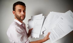 Guardian Australia journalist Paul Farrell displays records about him which were kept by the Australian Federal Police. The information was released on request as per the terms of the Privacy Act (1988). Photo taken in Guardian Australia’s office in Sydney, Australia, on 5 February 2015. By Jonny Weeks for The Guardian.