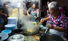 Street food stalls at the vibrant night market in Georgetown, Penang.