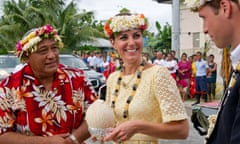 Catherine and William drink coconut milk from a tree planted by the Queen in 1982, during a 2012 visit to Funafuti, Tuvalu.