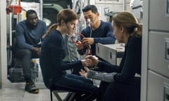 This image released by Netflix shows Shamier Anderson, from left, Anna Kendrick, Daniel Dae Kim and Toni Collette in a scene from “Stowaway.” (Netflix via AP)