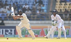 England wicketkeeper Ben Foakes looks on as India batsman Rohit Sharma picks up runs on day one