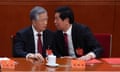 Li Zhanshu (right) talks with former Chinese president Hu Jintao.