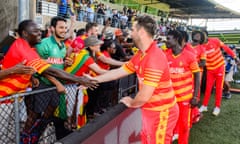 Zimbabwe celebrate with fans after their win in the  third ODI against Australia.