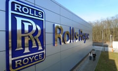 A huge Rolls-Royce logo on the side of a building