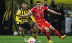 Marcel Sabitzer (right) battles with Jude Bellingham during Bayern Munich’s game against Borussia Dortmund in October.