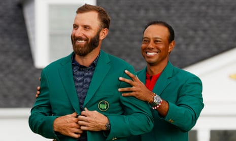‘Awesome and unbelievable’: Dustin Johnson receives green jacket from Tiger Woods – video