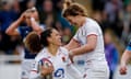 Tatyana Heard celebrates scoring their fourth try with Sarah Hunter.