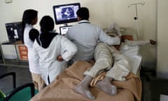 Mecical staff attend to a patient at Janakpuri super speciality hospital in New Delhi