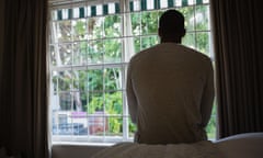 Man sitting on bed