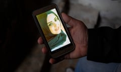 Mohamed Khodor shows a photograph of his daughter Hanaa on his phone