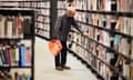 Man browsing books in Manchester central library