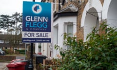 A For Sale sign outside a terraced house in Slough, Berkshire