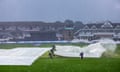 The coves are brought on amid rain at Taunton