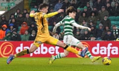 Kyogo Furuhashi (right) scores Celtic’s third goal in their 3-0 victory over Livingston