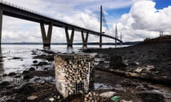 The pipe end which draws sea water from the Firth of Forth with The Queensferry Crossing bridge in the background. 