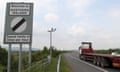 Traffic passes a border sign at Newry the the border of Northern Ireland.