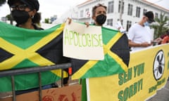 People calling for slavery reparations protest outside the British high commission during a visit by Prince William and Catherine to Jamaica in 2022.
