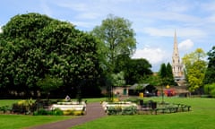 lush green park with flowerbeds