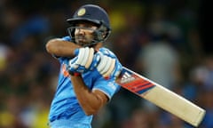 India's Rohit Sharma plays a shot while batting against Australia during their Cricket World Cup semifinal in Sydney, Australia, Thursday, March 26, 2015. (AP Photo/Rick Rycroft)