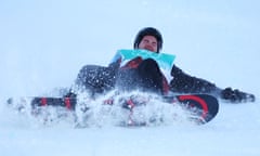 Sebastien Toutant of Canada suffers a heavy fall during his qualifying run.