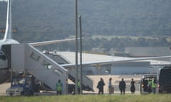 Passengers, including British-Australian academic Kylie Moore-Gilbert, disembark an Australian government jet after arriving from the Middle East at Canberra airport