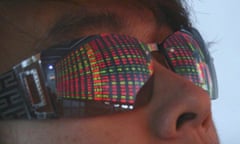 File picture of a college student watching an electronic stock board at a stock exchange in Xiamen<br>A college student watches an electronic stock board at a stock exchange in Xiamen, in southeast China's Fujian province, in this September 10, 2007 file picture. To match story CHINA-MARKETS/PSYCHOLOGY REUTERS/Stringer/Files CHINA OUT. NO COMMERCIAL OR EDITORIAL SALES IN CHINA