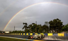 The #4 CLM-AER of Simon Trummer of Switzerland, Pierre Kaffer of Germany and Oliver Webb of Great Britain races under a rainbow during practice at Le Mans on Wednesday