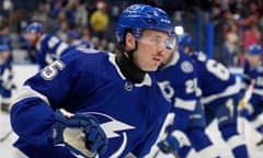 FILE - Tampa Bay Lightning left winger Cole Koepke wears a protective neck guard before an NHL hockey game against the Edmonton Oilers Saturday, Nov. 18, 2023, in Tampa, Fla. Koepke was en route to a minor league game with Syracuse of the AHL last month when he heard from a friend that Adam Johnson had been cut by a skate blade during a hockey game in Britain. The death of the 29-year-old former Pittsburgh Penguins player has not only forced the sport to re-examine safety regulations but prompted Koepke to the wear a turtleneck-style neck guard. (AP Photo/Chris O'Meara, File)