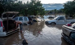 Flooded cars along a highway in San Pedro Sula, Honduras, days after Hurricane Eta hit the region.