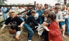 East German refugees flee through a gate near Sopron on 19 August, 1989.