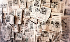 A pile of newspaper crosswords.