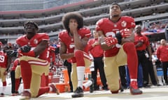 Eli Harold, Colin Kaepernick, Eric Reid<br>FILE - In this Oct. 2, 2016 file photo, from left, San Francisco 49ers outside linebacker Eli Harold, quarterback Colin Kaepernick and safety Eric Reid kneel during the national anthem before an NFL football game against the Dallas Cowboys in Santa Clara, Calif. An arbitrator is sending Kaepernick’s grievance with the NFL to trial, denying the league’s request to throw out the quarterback’s claims that owners conspired to keep him out of the league because of his protests of social injustice. (AP Photo/Marcio Jose Sanchez, File)