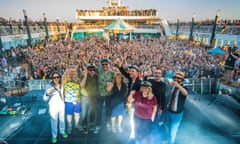 Fun ahoy! … Belle and Sebastian (Stuart Murdoch fourth from right) and fans on the indie festival cruise aboard the Norwegian Pearl.