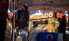Wave Of Live Performance And Theater Cancellations Across New York City Amid Coronavirus Surge<br>NEW YORK, NEW YORK - DECEMBER 21: A person receives a COVID-19 test near the Ambassador Theatre home to "Chicago" on December 21, 2021 in New York City. The holiday season, which drives large profits for the live theatre industry, was expected to continue at full capacity, but a surge in omicron variant cases across New York State and within the company have closed shows. Nine Broadway shows have announced cancelled performances due to a surge in COVID-19 cases. (Photo by Alexi Rosenfeld/Getty Images)