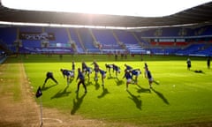 Reading players warm up ahead of last season’s WSL match against Arsenal at Madejski Stadium.