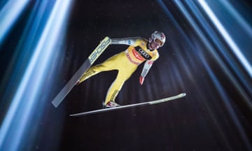 The viewpoint from which the photograph was taken, the skier’s pose, the faint stars and the shafts of light give an ethereal quality to this image of Daniel-André Tande as he takes his first jump at the Four Hills Tournament in Bischofshofen, Austria